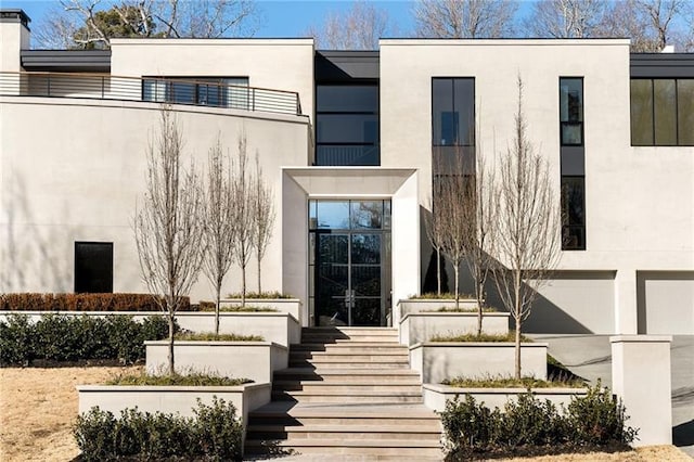 view of front of home featuring stucco siding