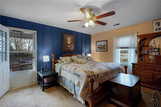 carpeted bedroom with ceiling fan