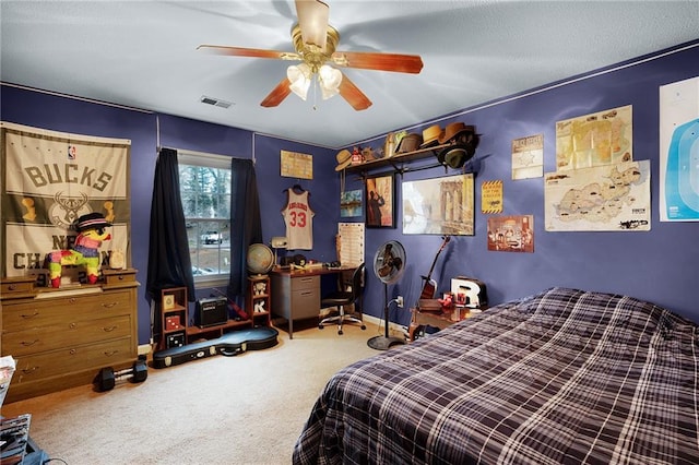 carpeted bedroom featuring ceiling fan