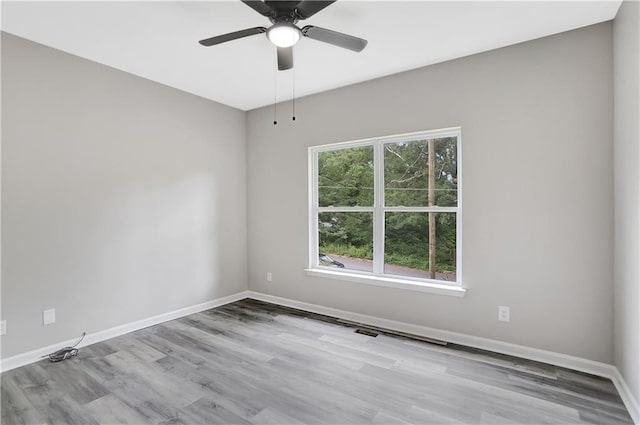 381 New Jersey Ave NW, Atlanta, GA 30314 - unfurnished room with wood finished floors and a ceiling fan