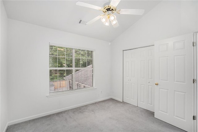 2949 Maple Walk Ct, Lawrenceville, GA 30044 - unfurnished bedroom with a closet, light colored carpet, vaulted ceiling, and ceiling fan
