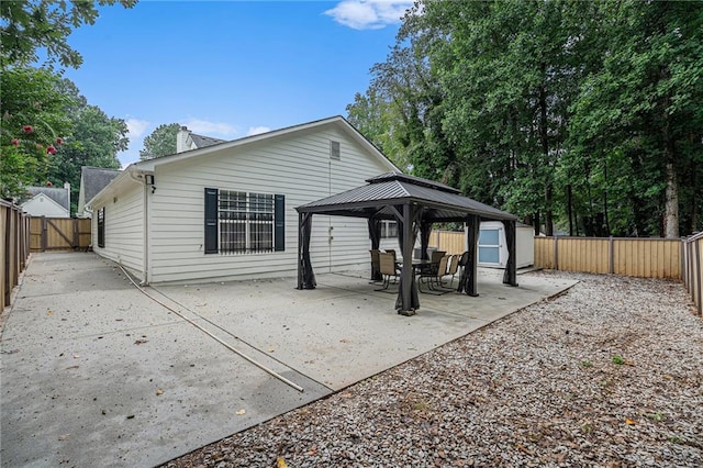2949 Maple Walk Ct, Lawrenceville, GA 30044 - rear view of house featuring a patio and a gazebo