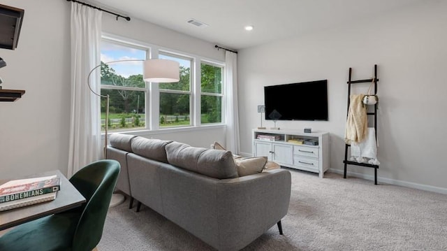 living room with light colored carpet