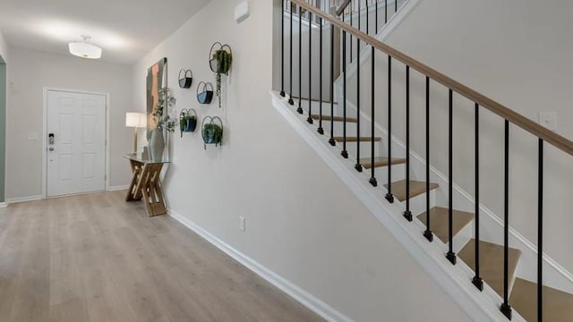 1346 Auburn Glen Rd, Dacula, GA 30019 - foyer featuring wood finished floors, baseboards, and stairs