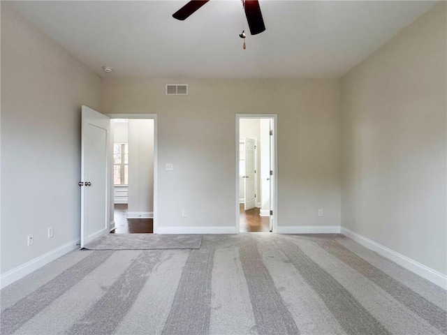 unfurnished bedroom featuring baseboards and carpet flooring