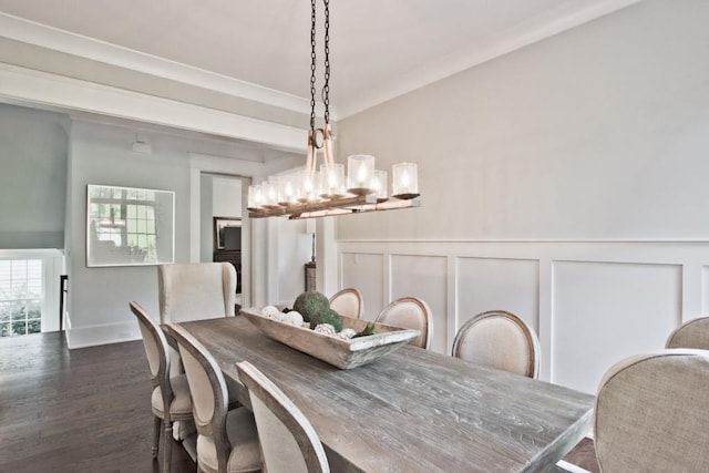 dining space featuring an inviting chandelier and dark wood-type flooring