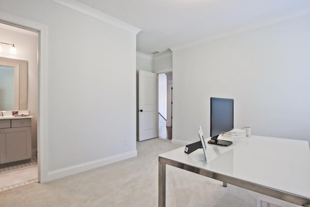 home office with crown molding and light carpet