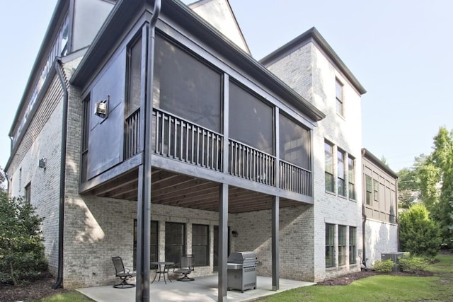 back of house with a patio area