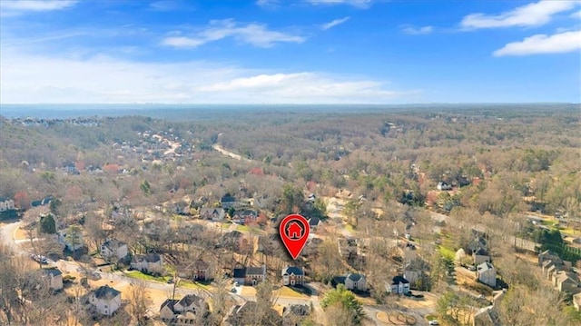 aerial view featuring a view of trees