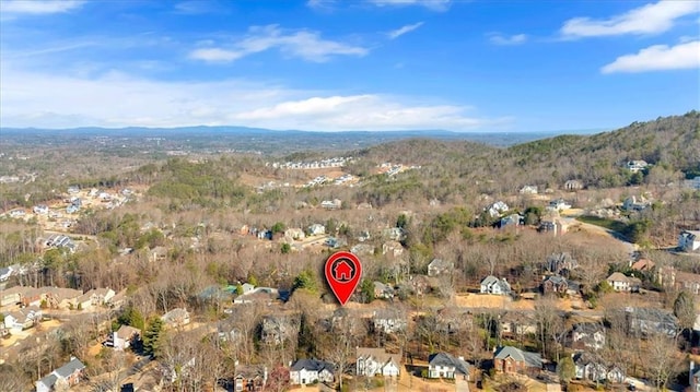 drone / aerial view featuring a mountain view