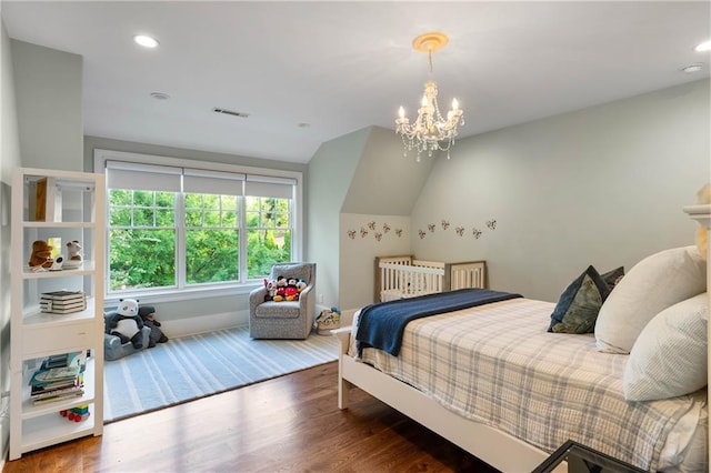 bedroom featuring wood finished floors, a chandelier, recessed lighting, and baseboards