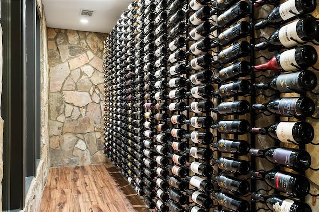 wine area with wood finished floors