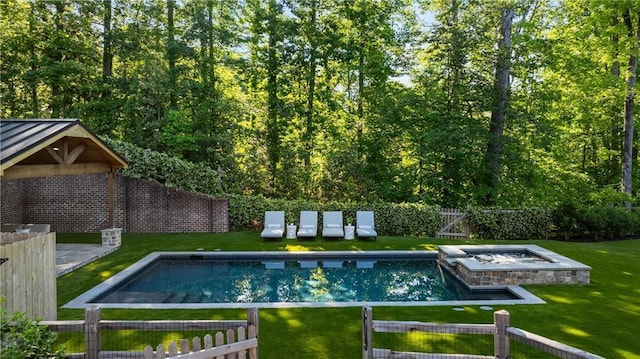 view of swimming pool featuring a pool with connected hot tub and a gazebo