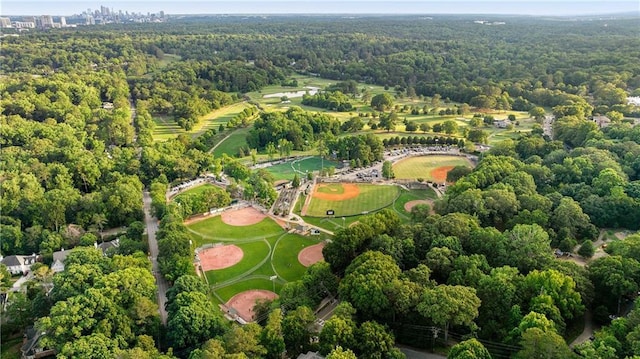 aerial view of property's location with a forest