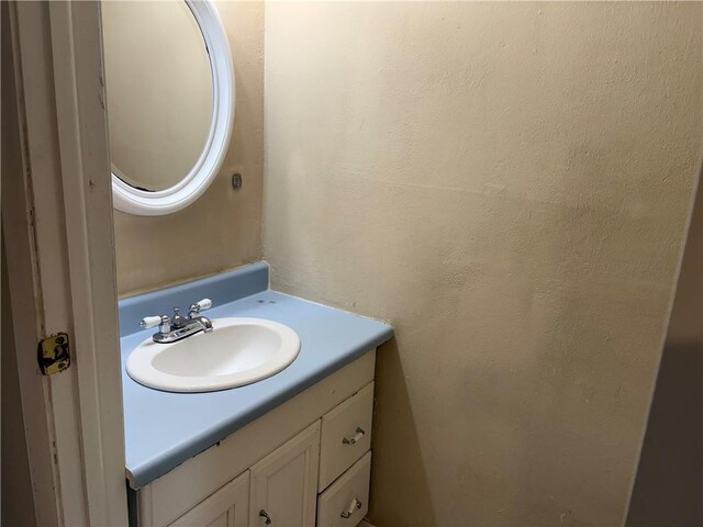 2834 Royal Path Ct, Decatur, GA 30030 - bathroom featuring vanity and a textured wall