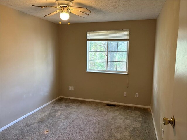 2834 Royal Path Ct, Decatur, GA 30030 - carpeted empty room featuring visible vents, baseboards, a ceiling fan, and a textured ceiling