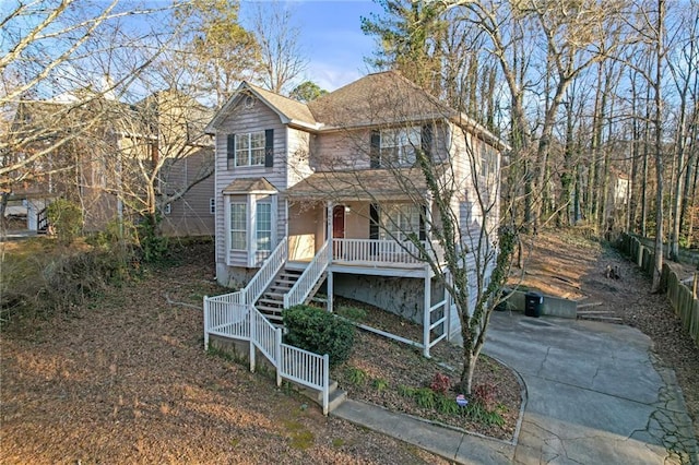 view of front property featuring covered porch