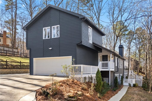 view of property exterior featuring a garage