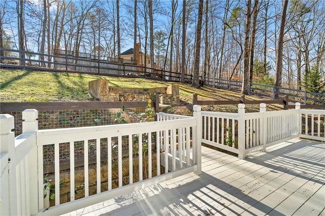 wooden terrace with a yard