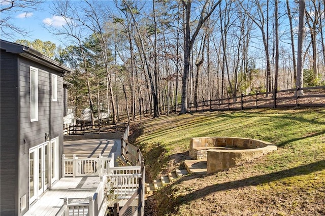 view of yard with a wooden deck