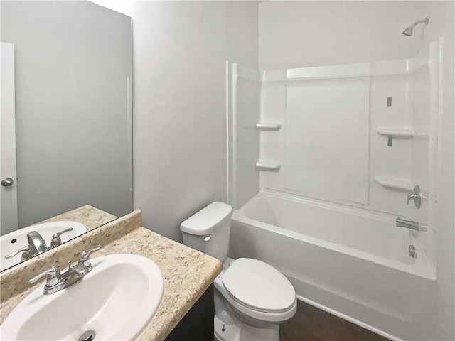 full bathroom featuring toilet,  shower combination, and vanity