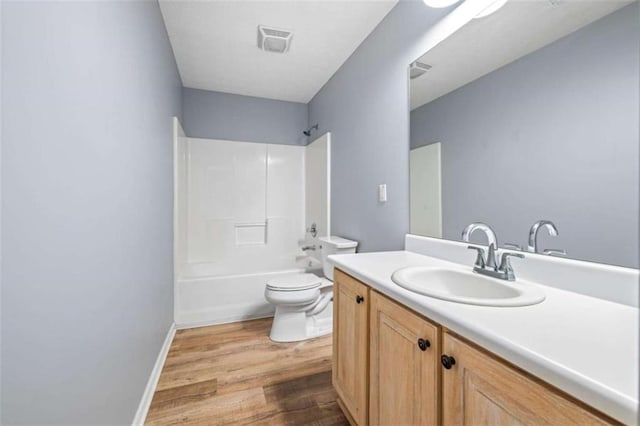 5375 Mountain View Pkwy, Lula, GA 30554 - full bath with vanity, wood finished floors, and shower / tub combination