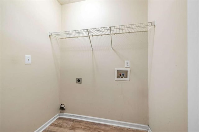 5375 Mountain View Pkwy, Lula, GA 30554 - laundry area with hookup for an electric dryer, washer hookup, and wood finished floors