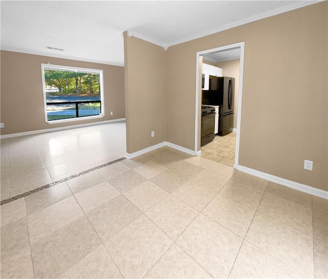 unfurnished room featuring crown molding and light tile patterned flooring