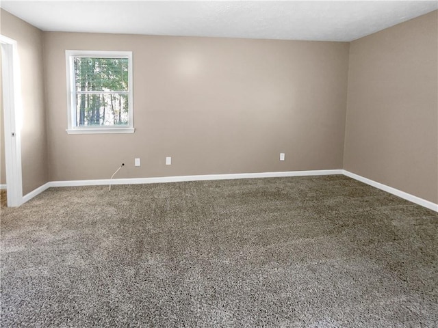 unfurnished room with carpet floors