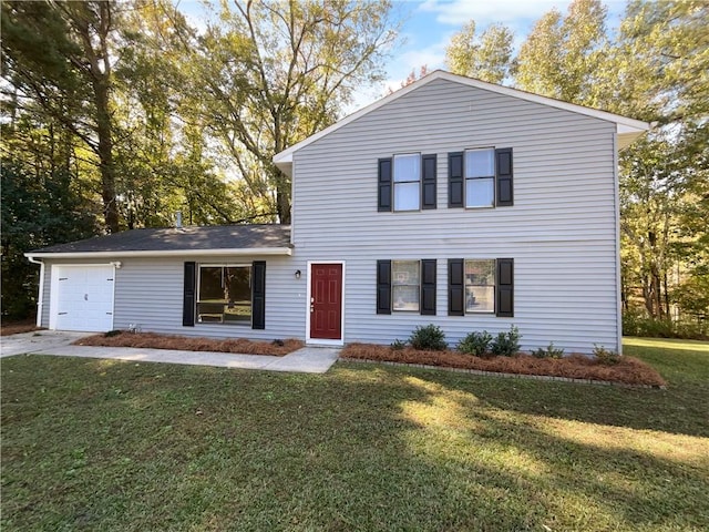 view of front facade with a front lawn and a garage