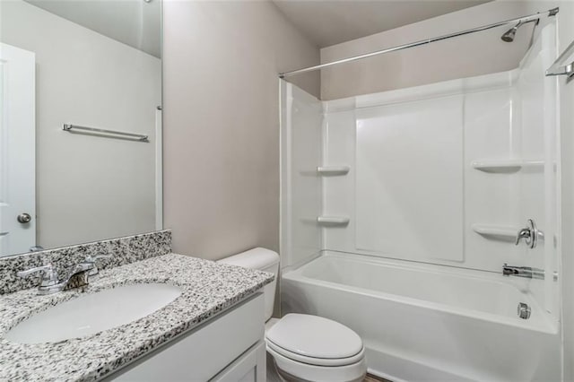 full bathroom with shower / bathing tub combination, oversized vanity, and toilet