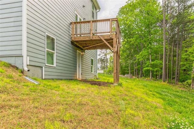 view of yard featuring a wooden deck