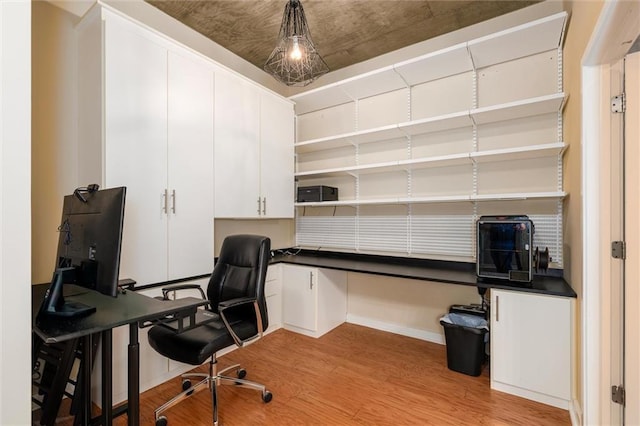 office space with light wood-style floors