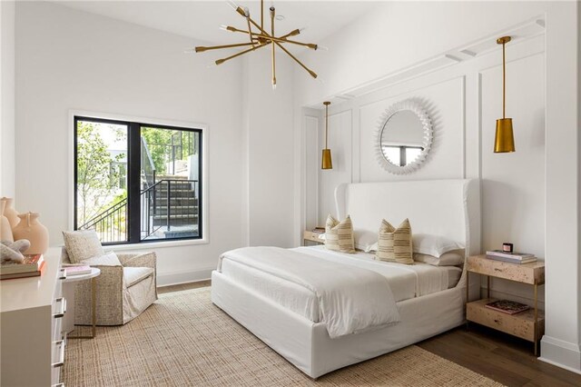 bedroom featuring an inviting chandelier