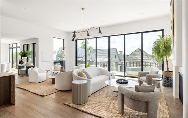 living room featuring plenty of natural light and hardwood / wood-style floors