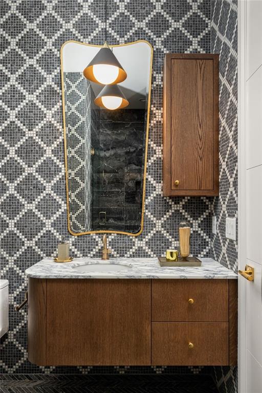 bathroom featuring an enclosed shower