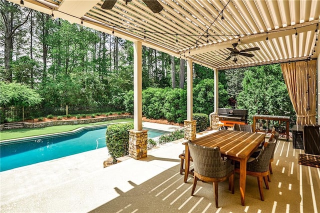 outdoor pool featuring a grill, a patio, a fenced backyard, outdoor dining area, and a ceiling fan
