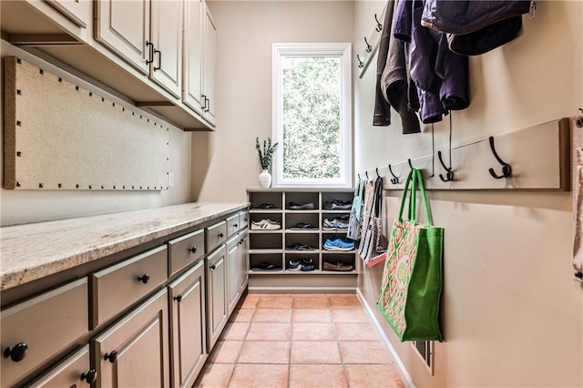 mudroom with light tile patterned flooring