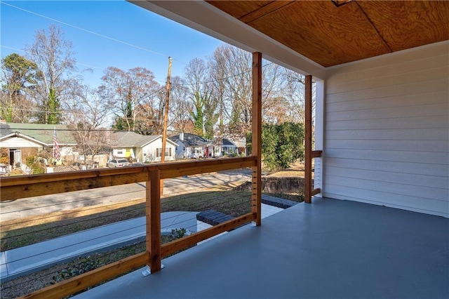 exterior space featuring a residential view and a balcony