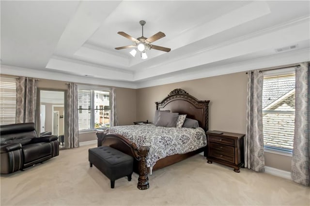 5810 Old Mill Trce, Lithonia, GA 30038 - bedroom featuring a raised ceiling, light carpet, baseboards, crown molding, and ceiling fan