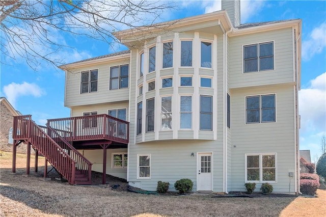 5810 Old Mill Trce, Lithonia, GA 30038 - rear view of property featuring a deck, stairs, and a chimney