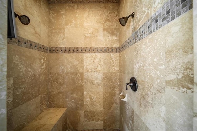 room details featuring a tile shower