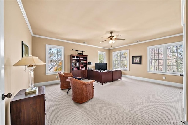 home office with light carpet, plenty of natural light, ceiling fan, and ornamental molding