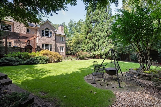 view of yard with a pergola