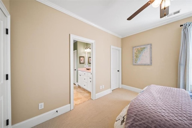 bedroom featuring ceiling fan, connected bathroom, ornamental molding, and light carpet