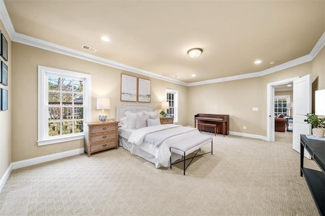 carpeted bedroom featuring crown molding