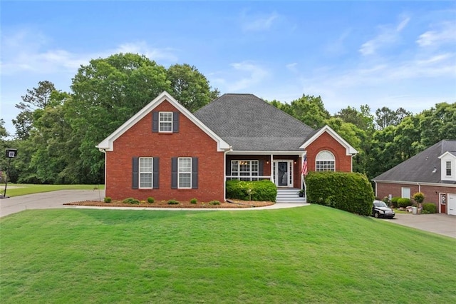 9507 Greens Mill Ct, Loganville, GA 30052 - view of front facade featuring brick siding and a front yard