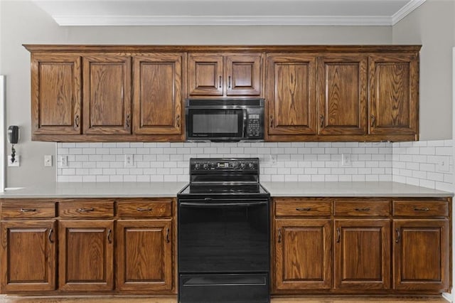 9507 Greens Mill Ct, Loganville, GA 30052 - kitchen with black appliances, light countertops, tasteful backsplash, crown molding, and brown cabinets