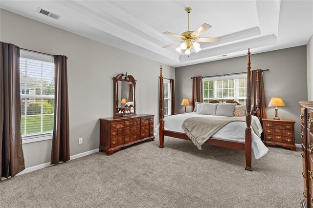 9507 Greens Mill Ct, Loganville, GA 30052 - bedroom with a raised ceiling, multiple windows, carpet, and baseboards