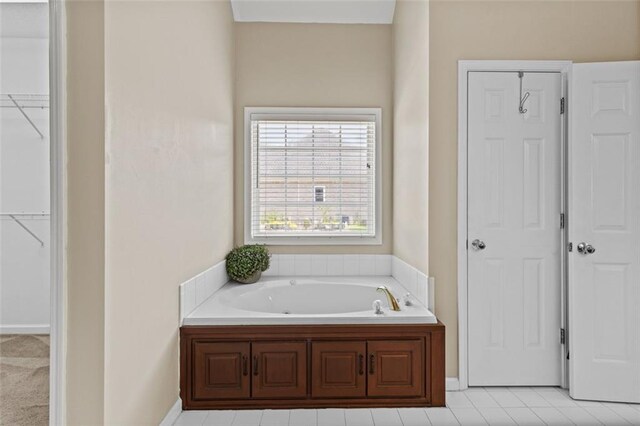 9507 Greens Mill Ct, Loganville, GA 30052 - full bathroom featuring a garden tub and a spacious closet